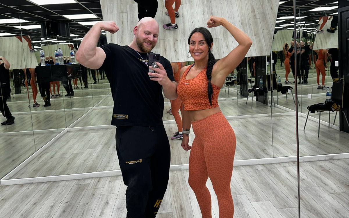Strength coaching session with client